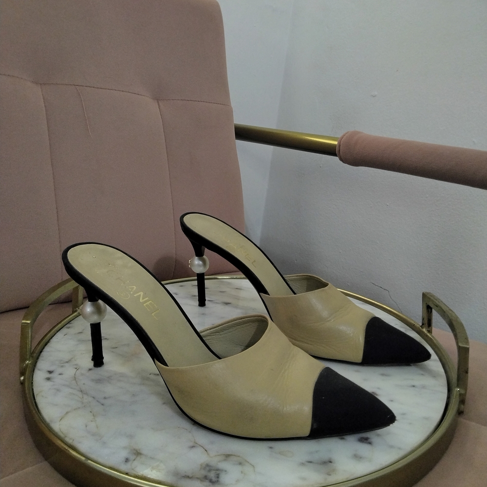 CHANEL Beige and Black Mules with Pearl Accent